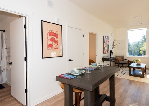 Arts Plaza Gresham Oregon Apartments A dining room with a table set for two.