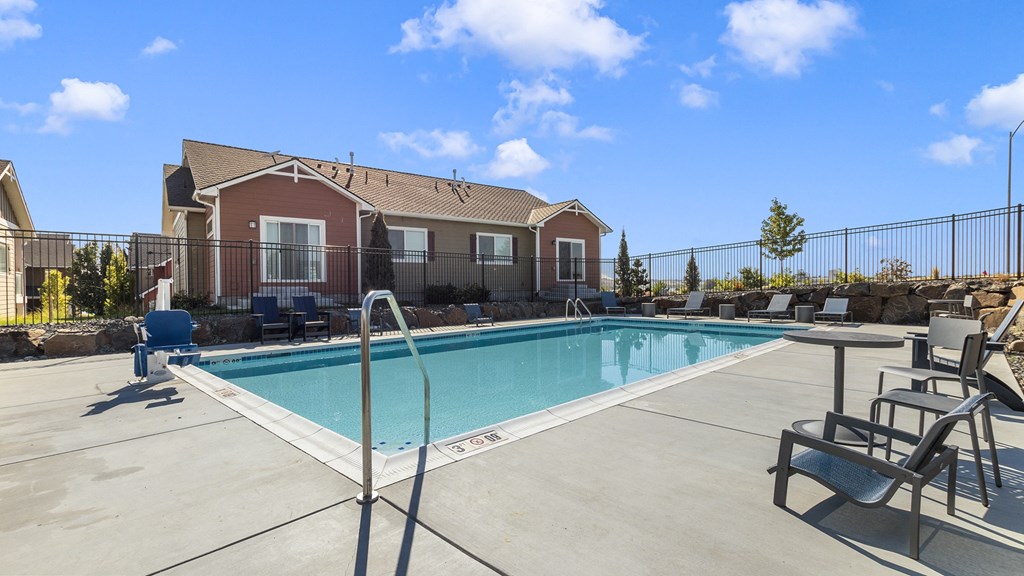 The Tides at Willow Pointe Apartments Pool Area and Lounge Chairs