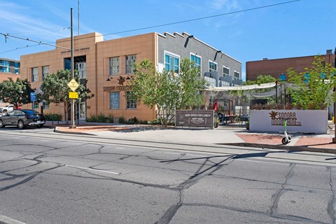 A street view of a building with a sign that reads Sonora.