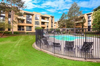 12 Central Square Pool with chairs, gates, and grass field - Photo Gallery 41