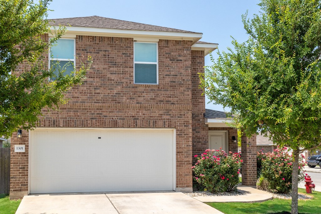 a house with a white garage door