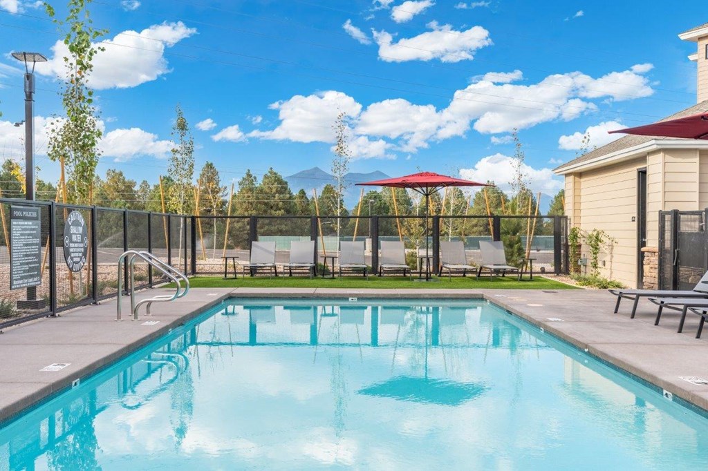 the swimming pool at our apartments with a resort style pool