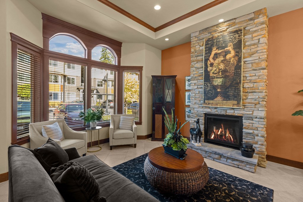 a living room with a fireplace and a couch