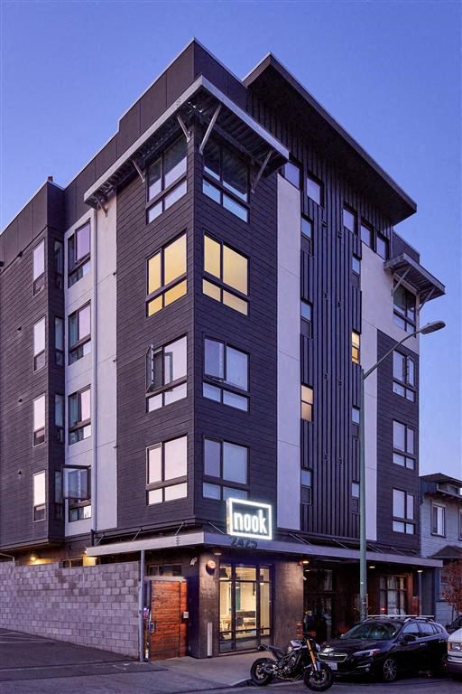 a tall building with a motorcycle parked in front of it