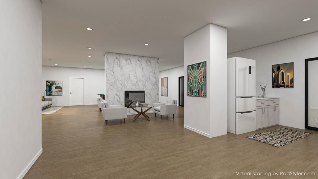 A modern living room with a fireplace and a dining area.