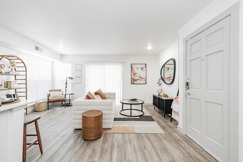 a living room with a couch and a table