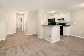 Atlas Apartments Kitchen, Living Room, and Dining Area Atlas Apartments Kitchen, Living Room, and Dining Area - Photo Gallery