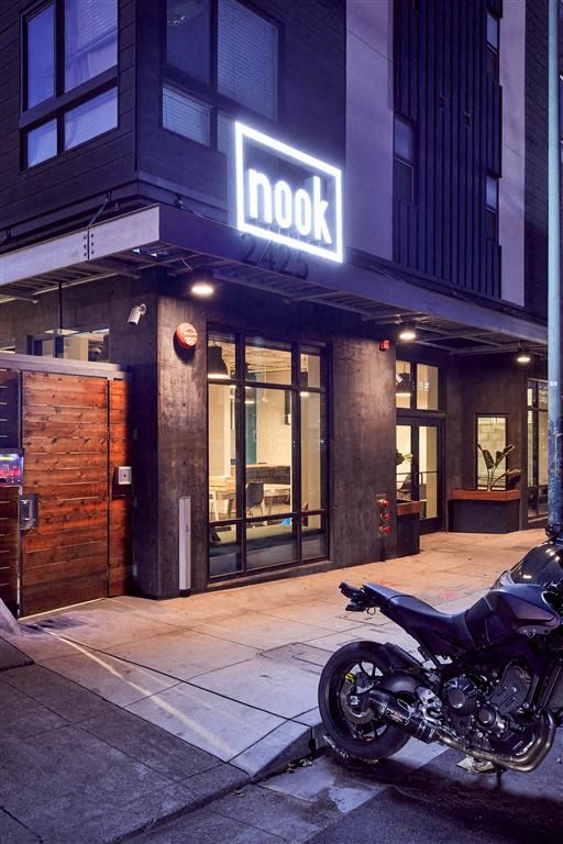 a motorcycle parked in front of a building