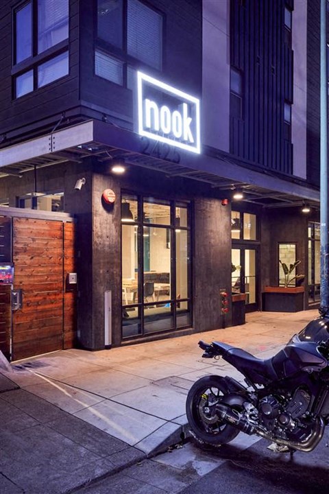 a motorcycle parked in front of a building