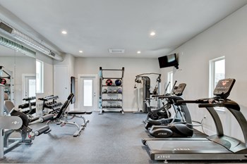 Horizon at Premier apartments fitness center with cardio equipment - Photo Gallery 6