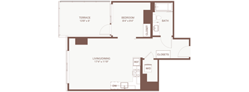A floor plan of a house with a terrace, bedroom, bath, living/dining area, closets, and a workspace.