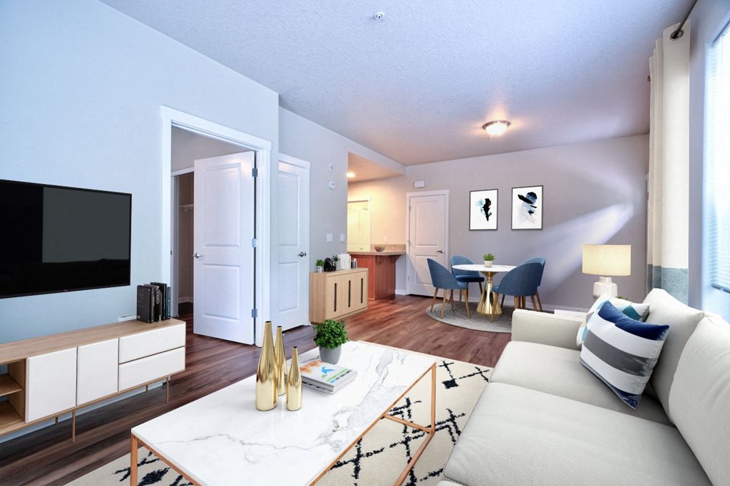 a living room with a couch and a tv