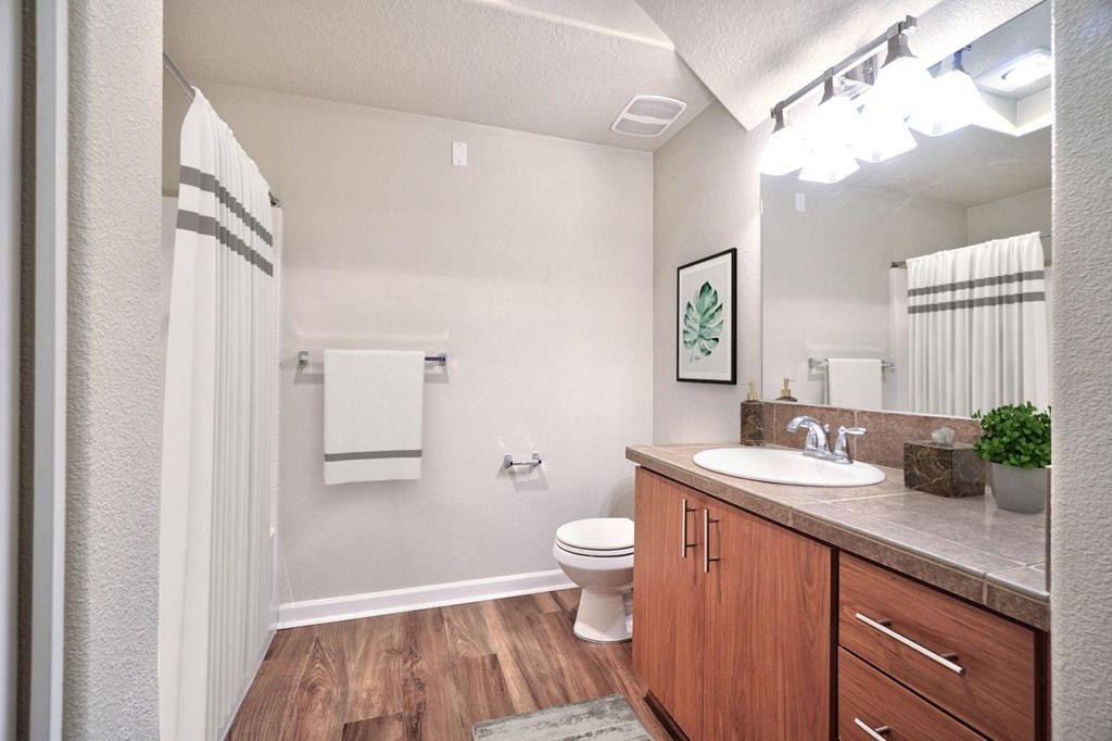 an empty bathroom with a toilet and a sink