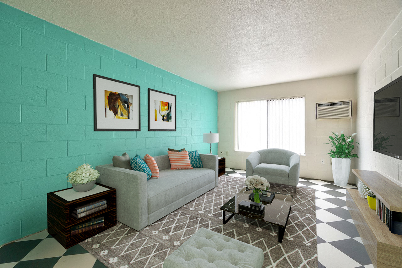 a living room with a couch and a chair