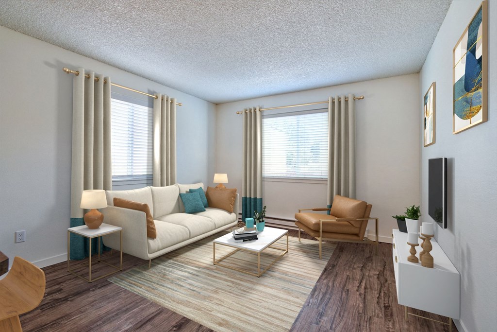a living room with a white couch and a table