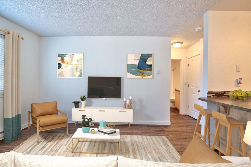 a living room with a couch and a television