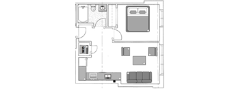 A floor plan of a room with a bed, a couch, a kitchen area, and a bathroom.