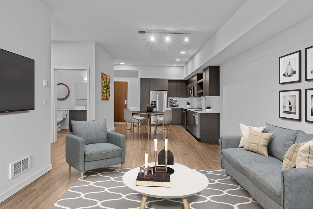 a living room with couches and a table