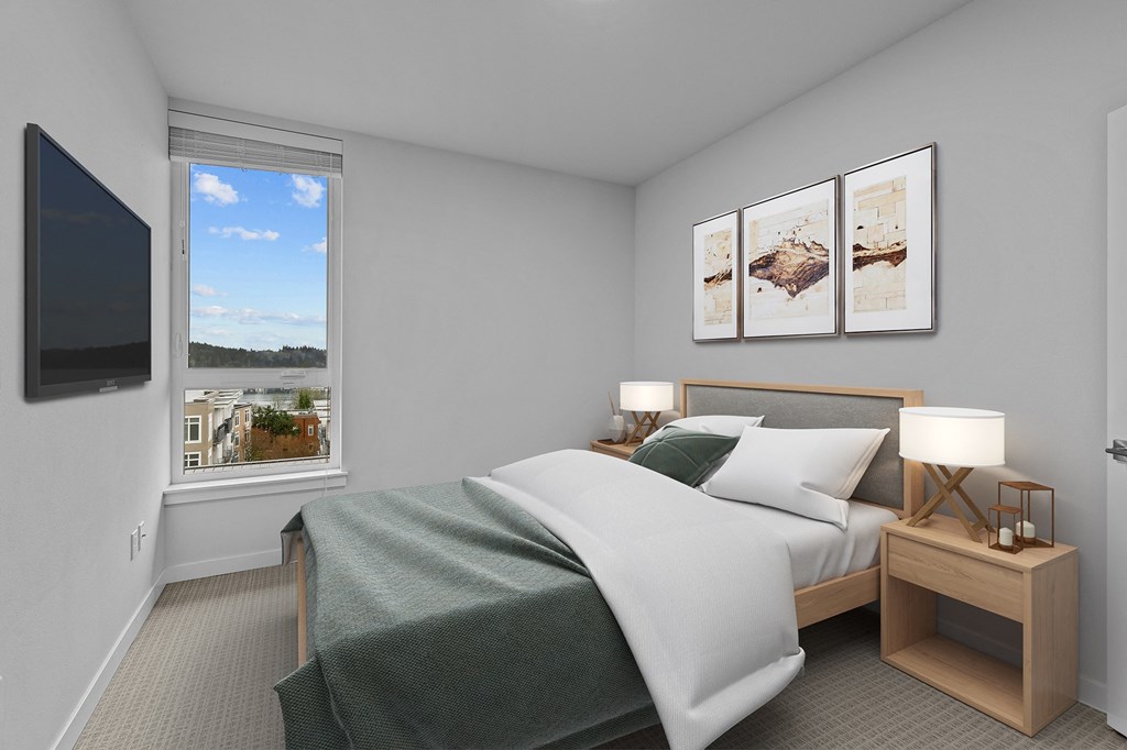 an image of a bedroom with a bed and a window