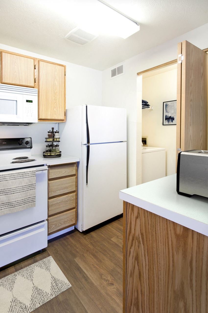 GoGo West Apartments 2 Bed Floor Plan Kitchen and Laundry Closet - Photo Gallery