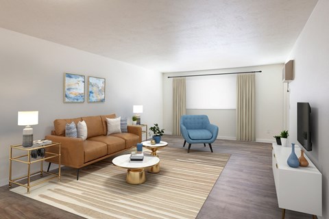 a living room with a brown couch and a blue chair