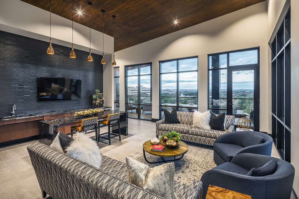 Aura Thirty2 Apartments Clubhouse Lounge with Seating