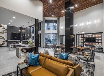 Aura Thirty2 Apartments Clubhouse with Seating - Photo Gallery 3