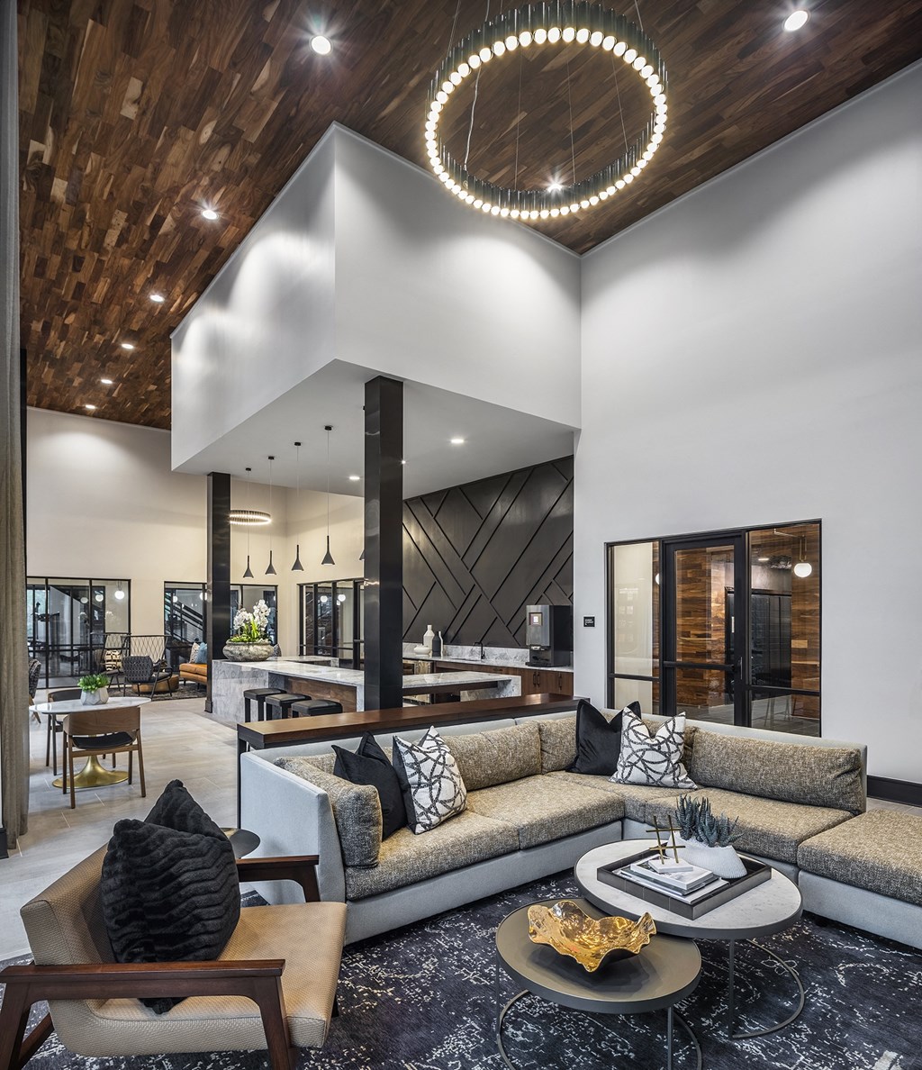 Aura Thirty2 Apartments Clubhouse with Seating