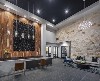Aura Thirty2 Apartments Clubhouse with Seating - Photo Gallery 5