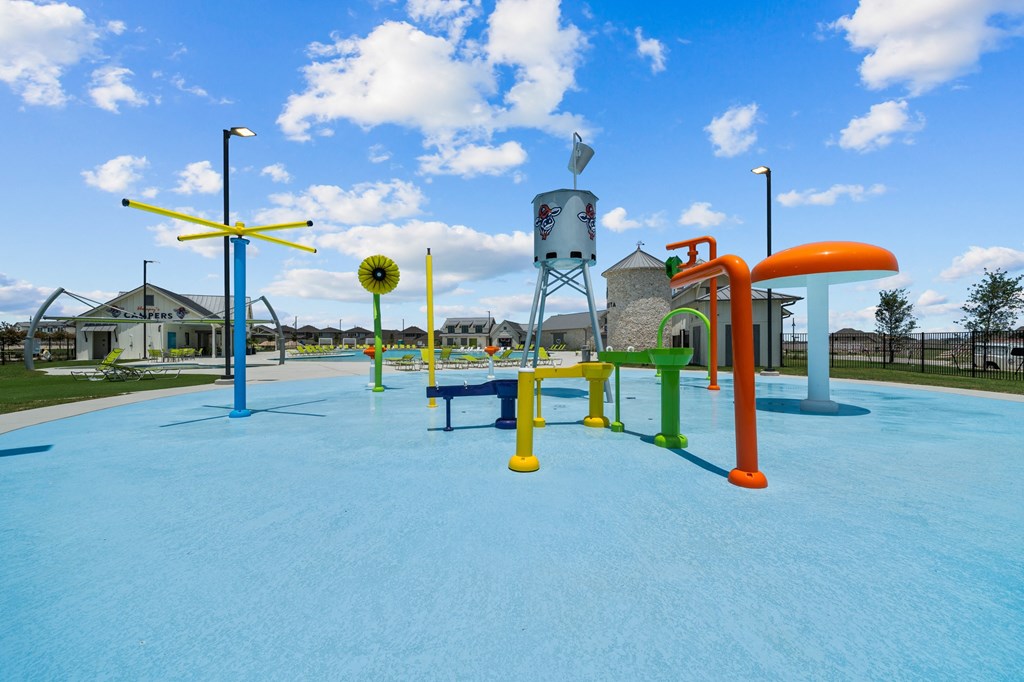 a large blue playground with slides and other playground equipment