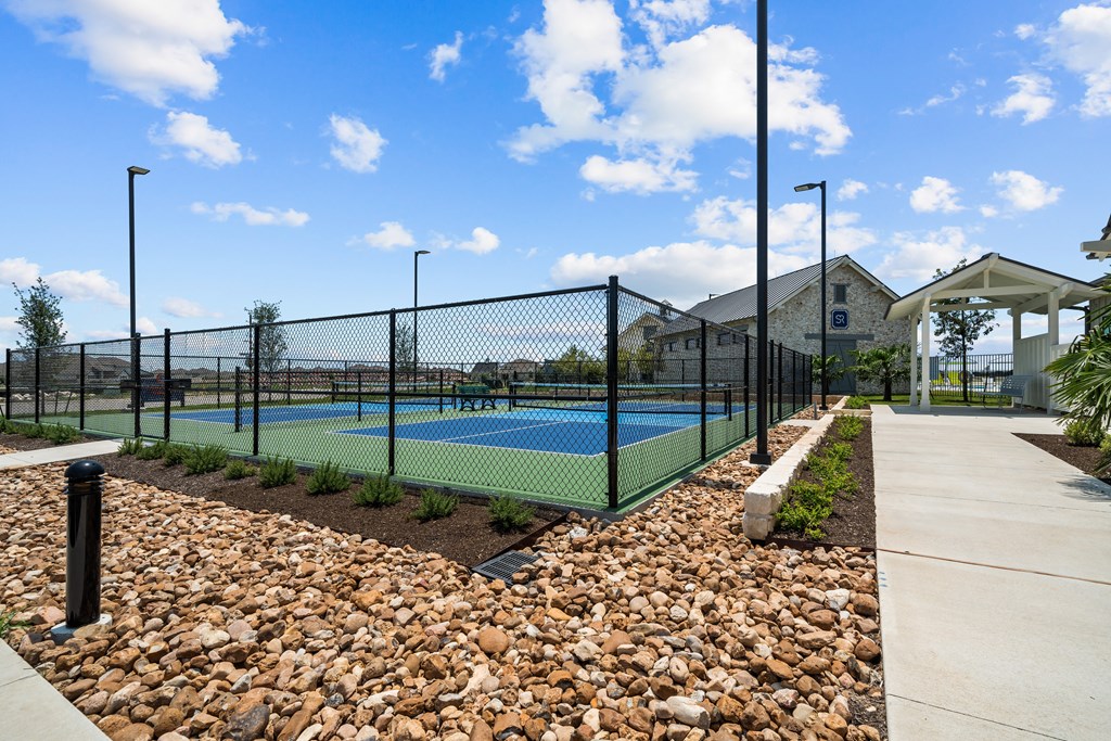the preserve at ballantyne commons tennis courts with a tennis court and a fence