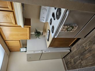 Ventana Apartment Kitchen with white appliances