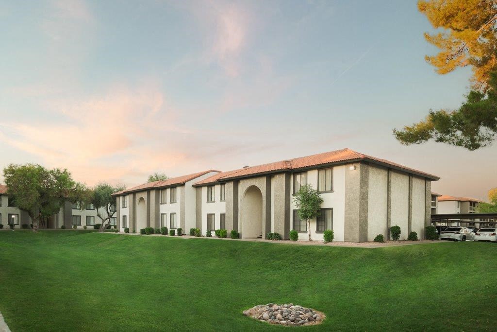 a row of train tracks on a black background with green and yellow lines