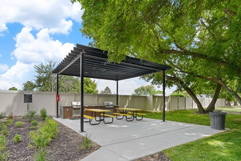 Covered picnic area with grills and seating at Clover Creek Apartments, Utah, 84123