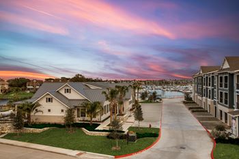 A residential area with houses and a marina.