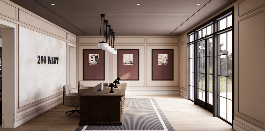 A reception area with a desk and chairs in front of a wall with the words "250 West" on it.