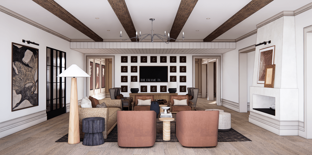 A living room with a fireplace and a large painting on the wall.