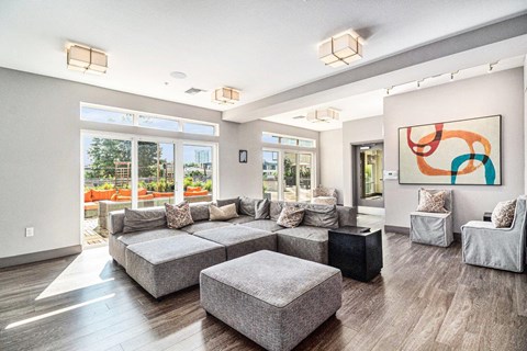 a living room with a large couch and a table