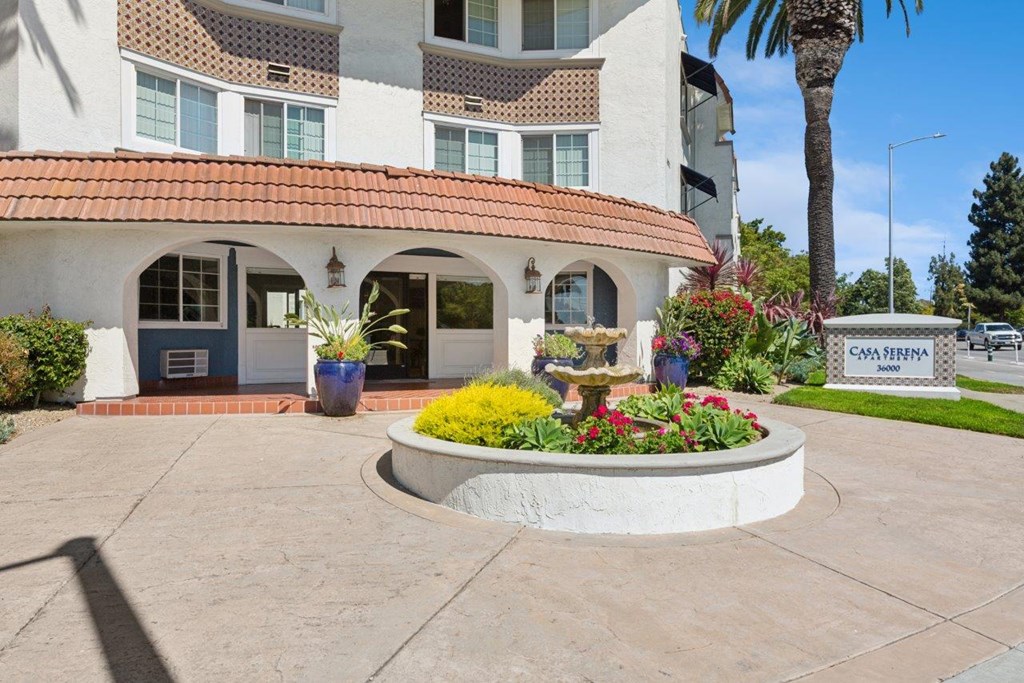 An office building with a red tile roof