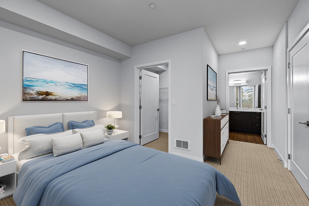 a bedroom with a large bed and a closet