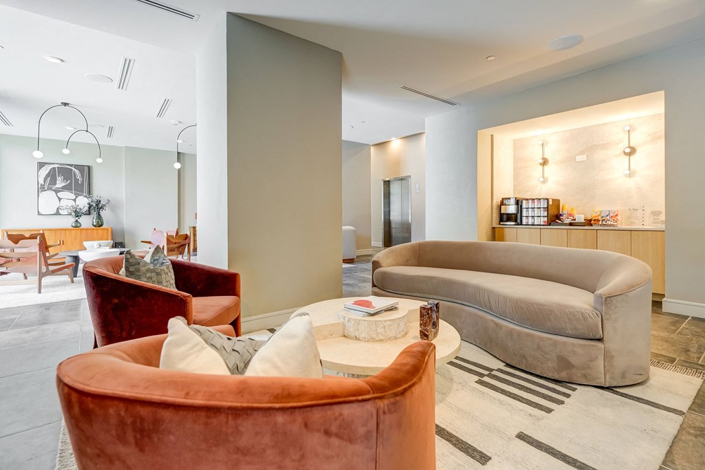 a living room with couches and a coffee table