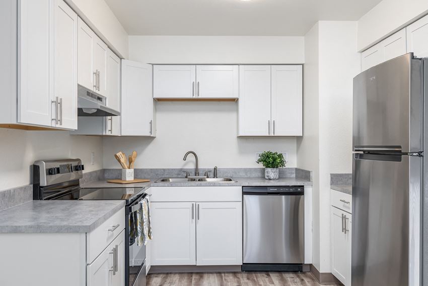 Hood Manor Apartments Kitchen with Stainless Steel Appliances - Photo Gallery 1