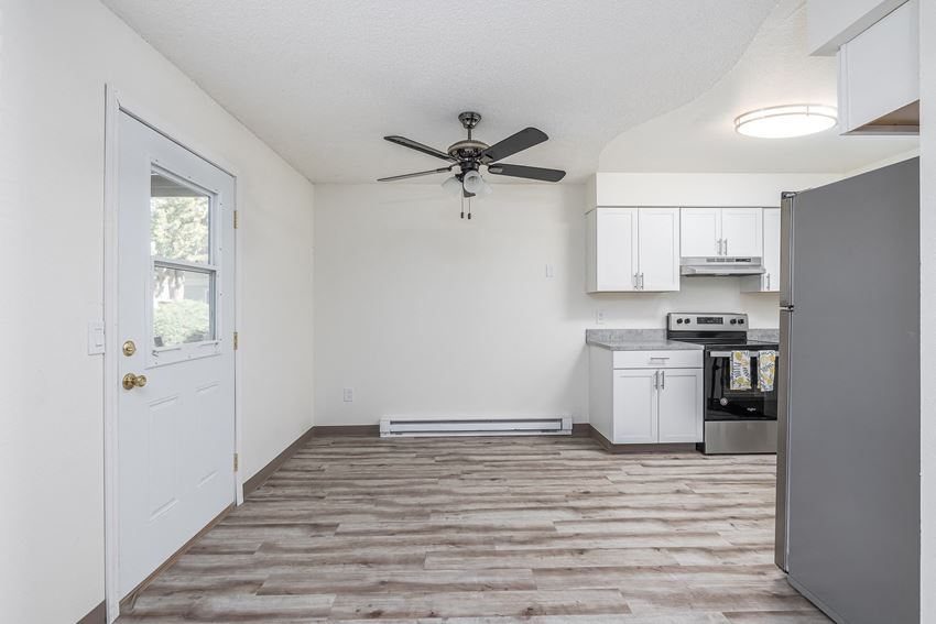 Hood Manor Apartments Dining Room with Ceiling Fan and Hardwood Flooring - Photo Gallery