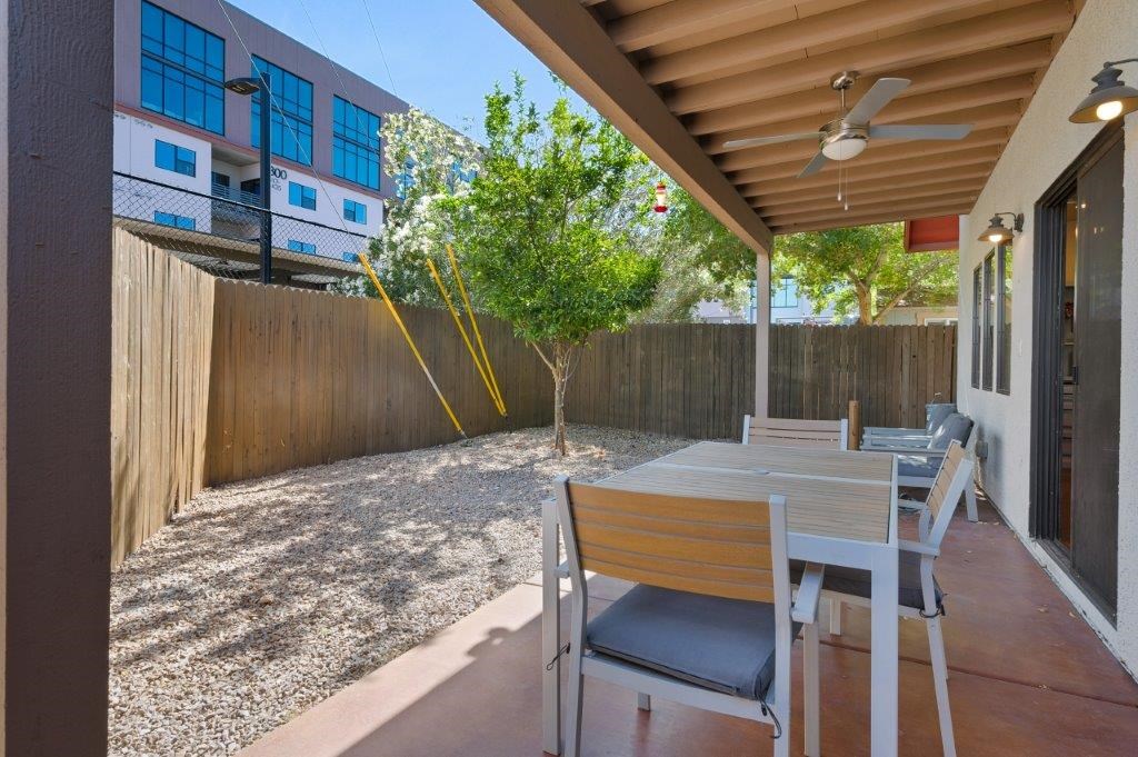 A patio with a table and chairs is shown.