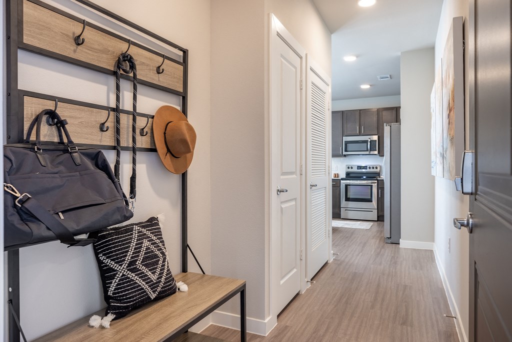 the enclave at homecoming terra vista hallway with bench and hat rack