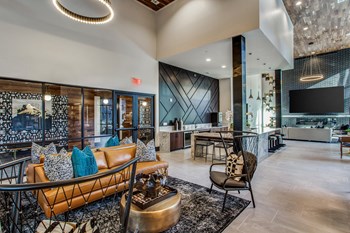 Aura Thirty2 Apartments Clubhouse with Seating - Photo Gallery 2