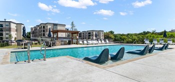 Northside at the Woodlands Outdoor Resort-Style Pool with Lounge Chairs - Photo Gallery 16