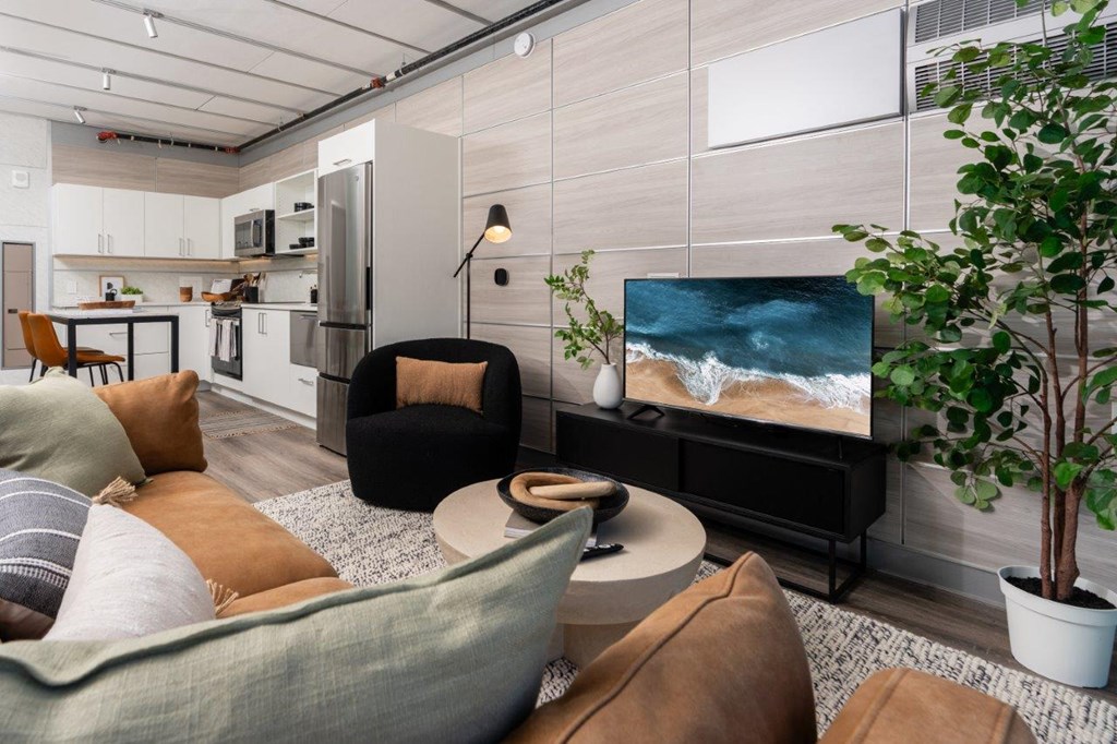 3ZERO3 New Apartments in Seattle, Washington Model Living Room and Kitchen