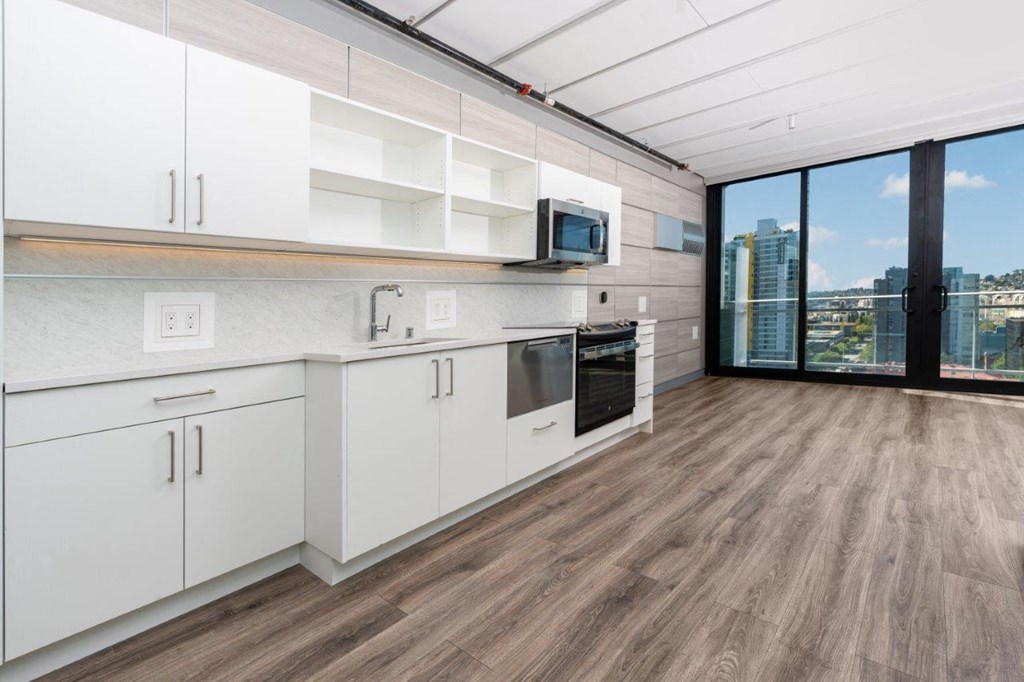 3ZERO3 New Apartments in Seattle, Washington Kitchen and Living Room