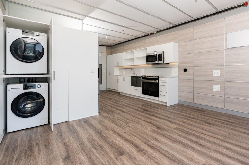 3ZERO3 New Apartments in Seattle, Washington Living Room and Kitchen